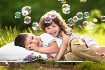 Portrait of a boy and girl in summer