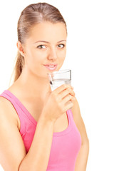 Portrait of a woman drinking water from a glass