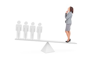 Obraz premium Scales weighing businesswoman and stick men