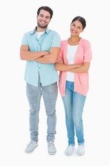 Fototapeta premium Happy couple with arms crossed
