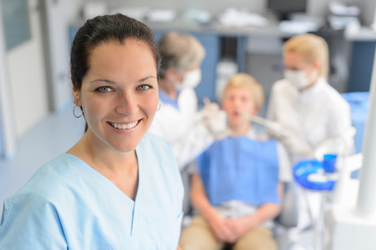 Professional dentist  team checkup teenage patient