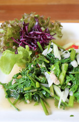 Fried mix vegetables on white plate.