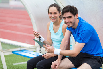 Obraz premium Sport coach training a young attractive woman