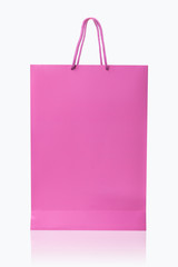 Pink shopping bag, isolated with clipping path on white backgrou