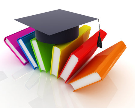 Colorful books and graduation hat
