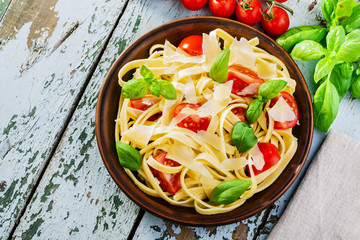 fettuccine with tomatoes and parmesan cheese © koss13