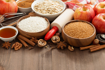 ingredients for baking cake on a wooden background, horizontal