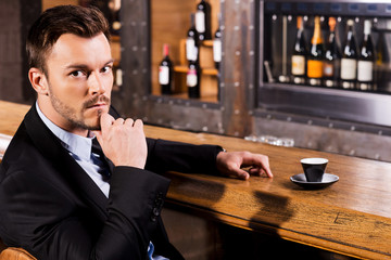 Relaxing with cup of fresh coffee.