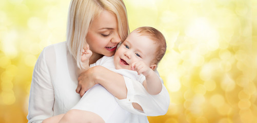 happy mother with smiling baby