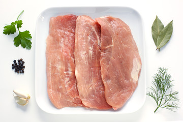 Pork schnitzel and herbs
