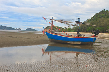 Fototapeta na wymiar Fishing boat on the beach