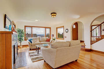 Bright living room in light ivory tones