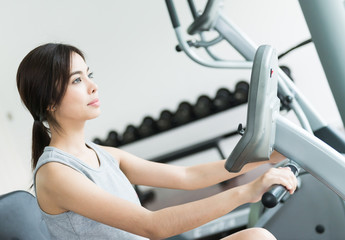 Fototapeta premium Woman workout at fitness