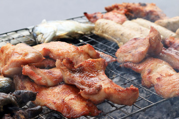 A lot of pork on the grill