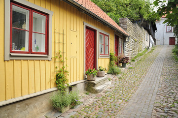Street with old houses in a Swedish town Visby