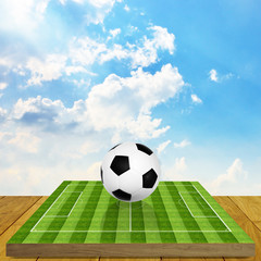 Ball on soccer field board game with sky