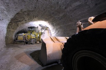 big machinery in a dark mine