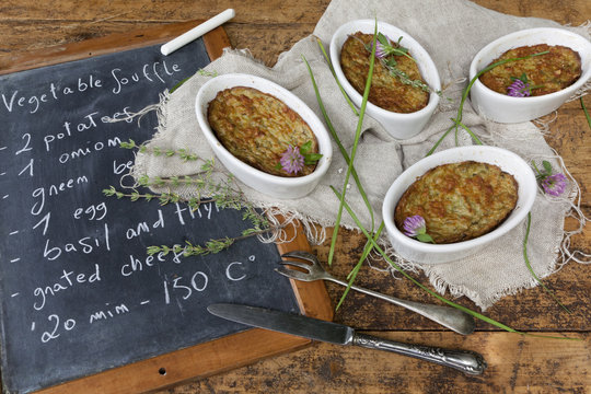 vegetables souffle oven baked with rustic background