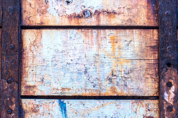 Old wood background texture. Vintage warehouse door and metal el