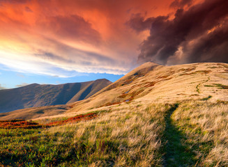 Obraz premium Colorful autumn sunrise in the mountains