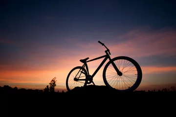 Papier Peint photo autocollant Vélo silhouette bicycle in sunset