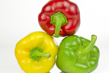 Red, green and yellow peppers