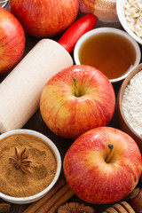 ingredients and spices for apple pie, top view, vertical