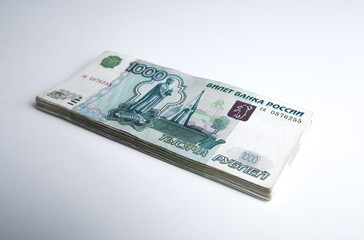 banknotes denominated 1000 rubles on a white
