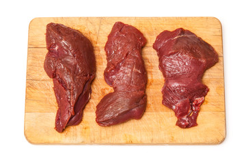 Kangaroo steaks isolated on a white background.