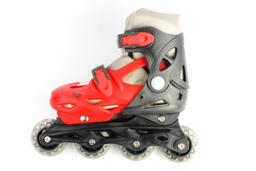 Red & Black Colored roller skates isolated on white