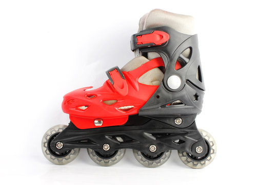 Red & Black Colored roller skates isolated on white