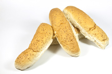 Golden Seeded Hotdog Rolls on White Background