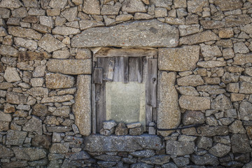 Door on an old stone wall