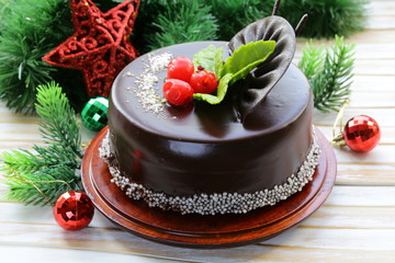 delicious Christmas chocolate cake on festive table