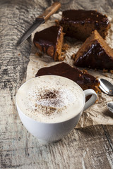 Coffee cup and chocolate cake
