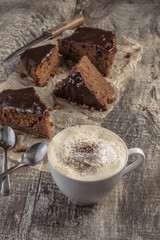 Coffee cup and chocolate cake