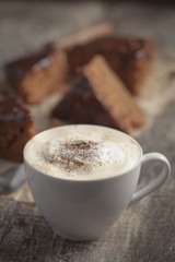 Coffee cup and chocolate cake