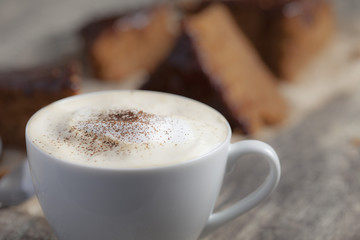 Coffee cup and chocolate cake