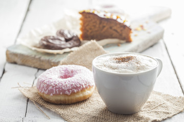 Coffee cup and chocolate cake