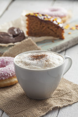 Coffee cup and chocolate cake