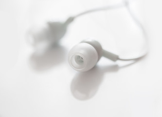 White earphones, close up photo, small dof
