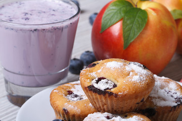 blueberry muffins, fresh peaches and a milkshake horizontal