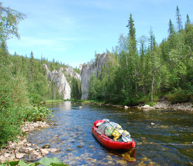 Canoe on the river in the virgin forests of Komi.