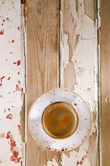 Coffee cup top view on old wooden table