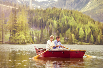 Fototapeta na wymiar Senior couple on boat