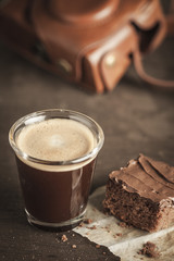 Coffee cup and chocolate cake