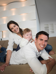 Fototapeta premium happy young family at home