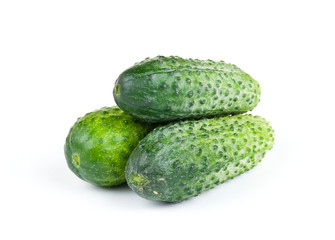 fresh three cucumbers isolated on white background