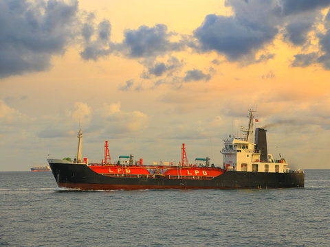 Docked LPG cargo ship at sunrise