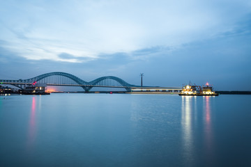 nanjing railway yangtze river bridge at dusk
